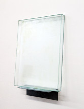 James Hyde The Phantom who Dances in your Absence, 2007 Axle grease in glass box and galvanized steel bracket and typed title 23 ½ x 28 x 2 inches Courtesy of the artist and Horton Gallery